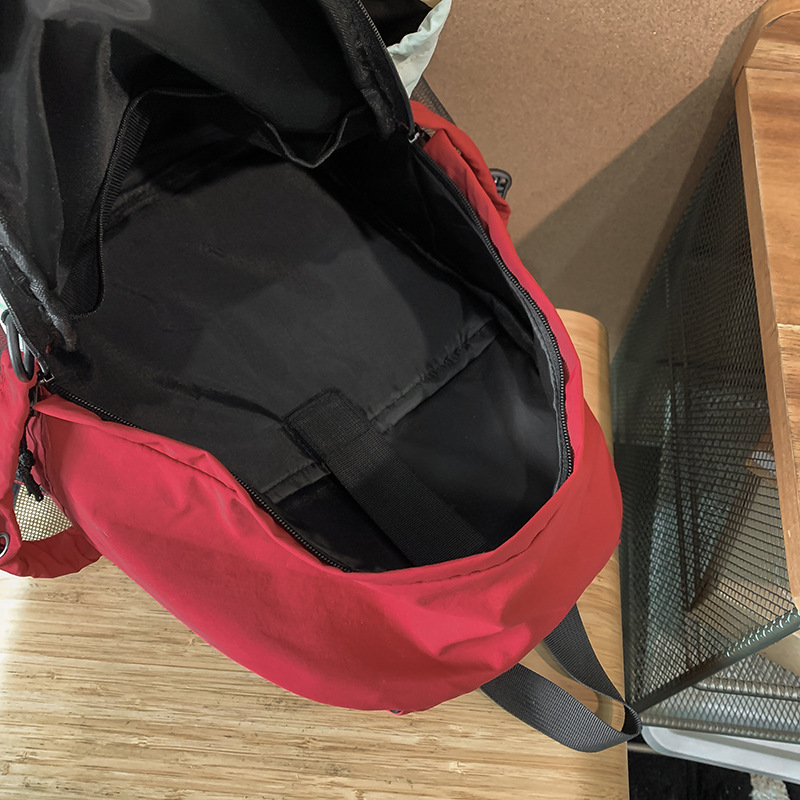 New autumn and winter color-blocking backpack with a school style, large capacity, outdoor lightweight sports backpack suitable for both men and women Application Scenario