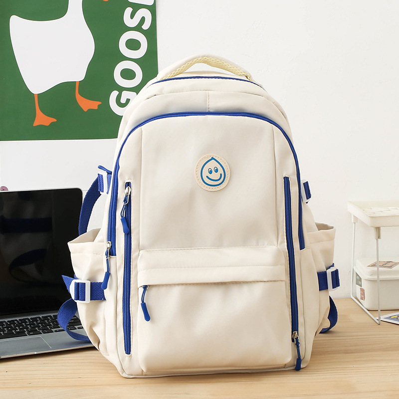 2025 New style of smiling face, large capacity, versatile, fashionable and casual college student backpack with prints for junior and senior high school students Specification drawing