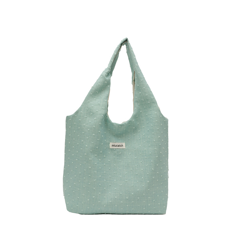 Korean style fashionable casual large-capacity tote bag for women 2025 summer new commuting canvas bag, simple single-shoulder women's bag Item Picture
