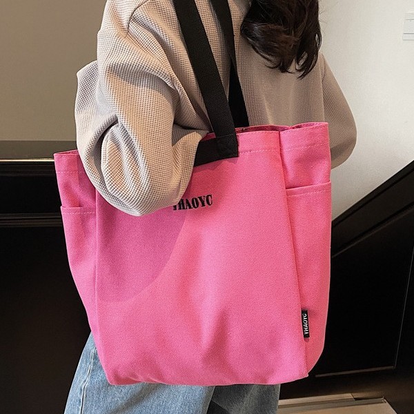 Popular new canvas bags for women's commuting to work, large-capacity single-shoulder bags, simple tote bags, and hand-held canvas bags for classes Application Scenario