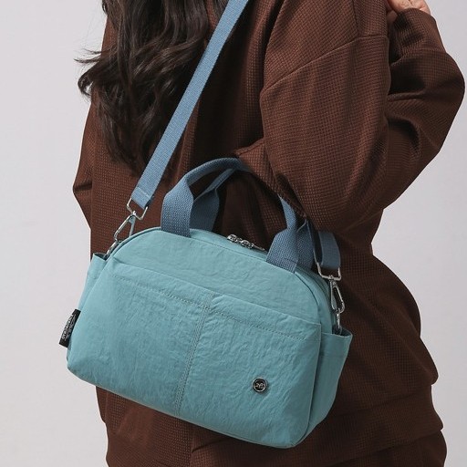 A new solid-color casual and versatile women's backpack, a multi-color Oxford fabric single-shoulder crossbody handbag, lightweight and with a large capacity full figure
