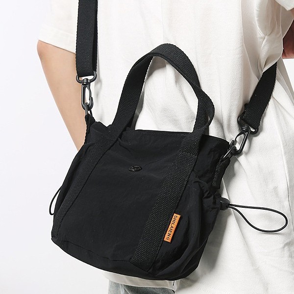New cross-border versatile large-capacity handbag, women's single-shoulder bag, simple commuting bucket bag, student trendy tote bag details Picture