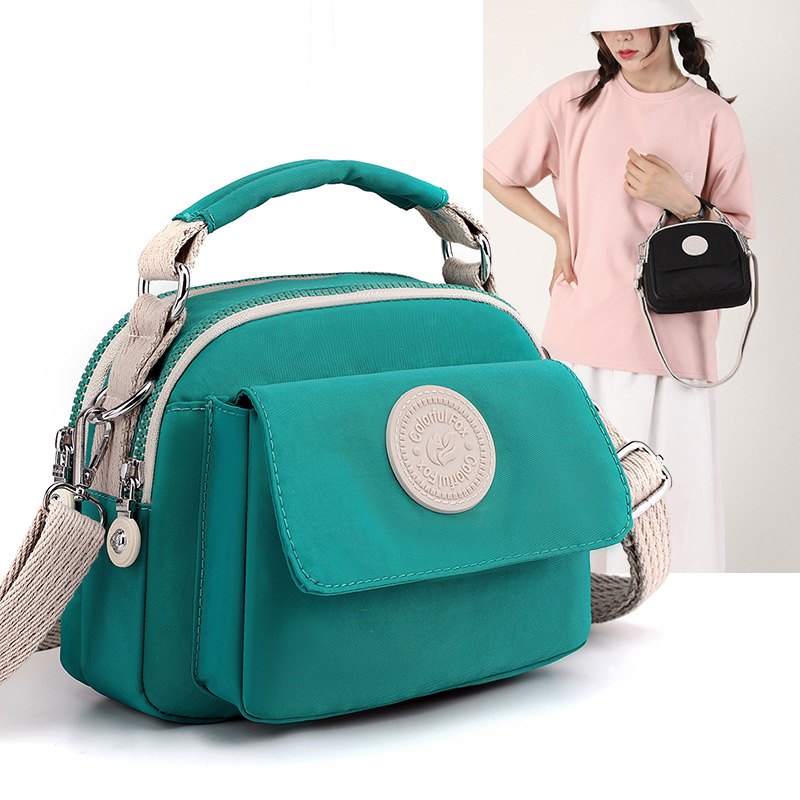 New cross-border women's fashion and trend crossbody bag, Japanese style simple water repellent bag, lipstick, loose change portable handbag full figure
