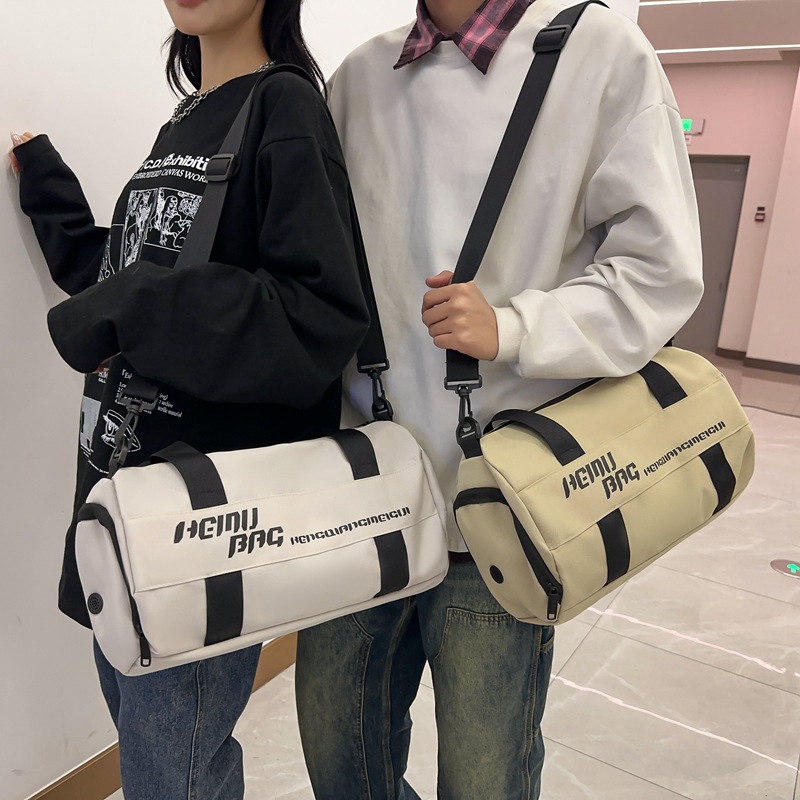 New large-capacity luggage bags for both men and women, trendy and lightweight portable fitness bags, and outdoor sports storage bags full figure