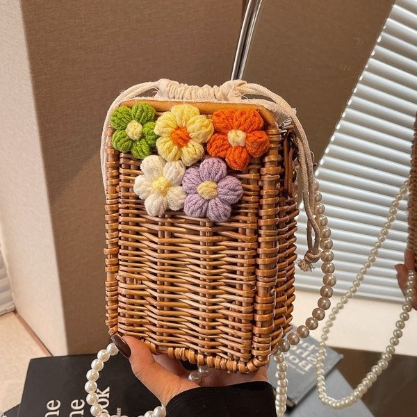 Spring and summer new style wool, flower and rattan woven, drawstring bucket, straw woven bag, sweet and fresh, simple and clean handbag, single-shoulder bag details Picture