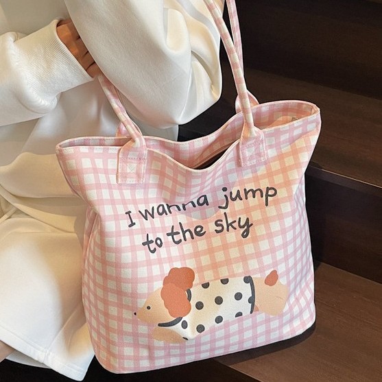 A new Japanese-style cartoon canvas bag, a student hand-held cartoon dog tote bag, and a portable handbag with a check pattern for girls full figure