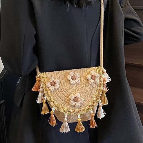 A new women's hand-woven bag with a ethnic style, fashionable and niche, beach vacation single-shoulder crossbody bucket bag details Picture
