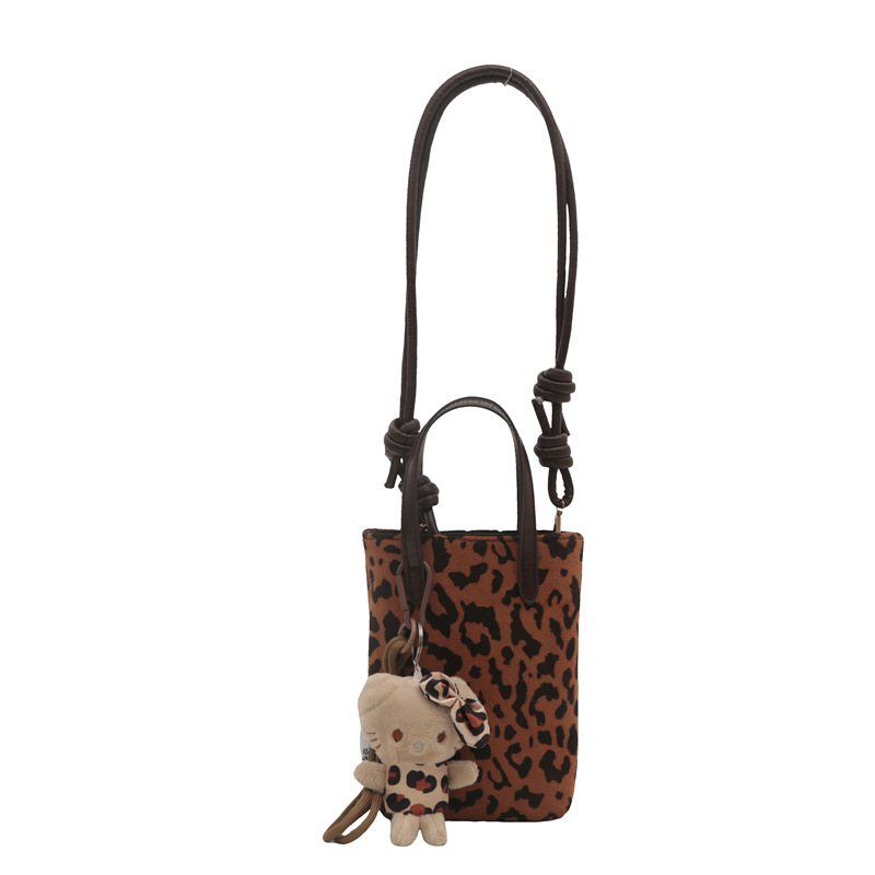 A retro and niche leopard print bag for women in 2024, a versatile crossbody bag with a textured suede and velvet surface Item Picture