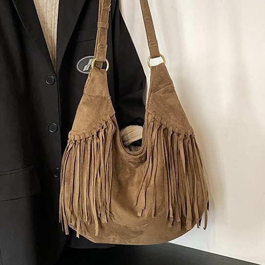 The 2025 new style of European and American tassel bag, trendy retro and unique saddle bag, single-shoulder bag, women's bag, casual and versatile crossbody bag details Picture