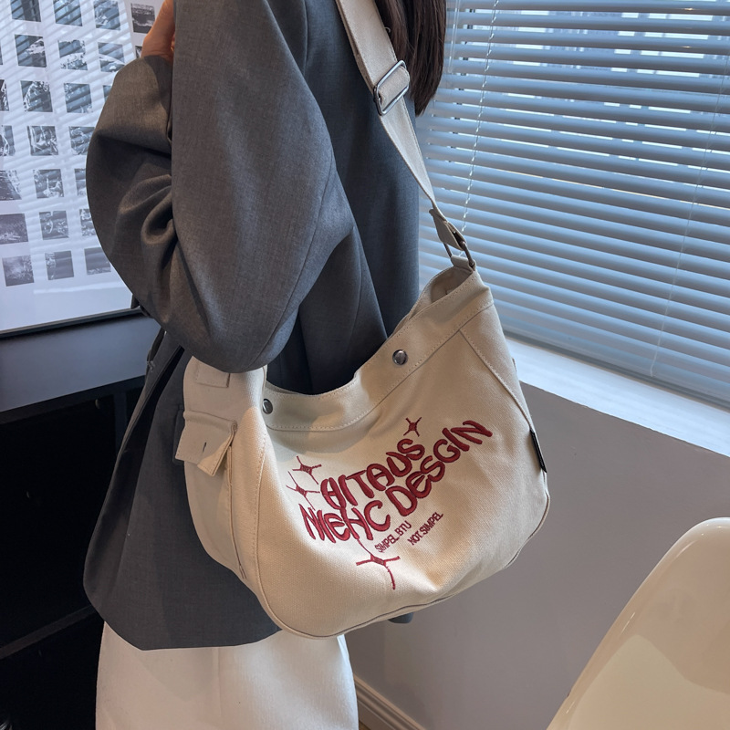 New Korean version canvas bag for women, large-capacity single-shoulder crossbody bag, college student class bag, letter-embroidered tote bag full figure