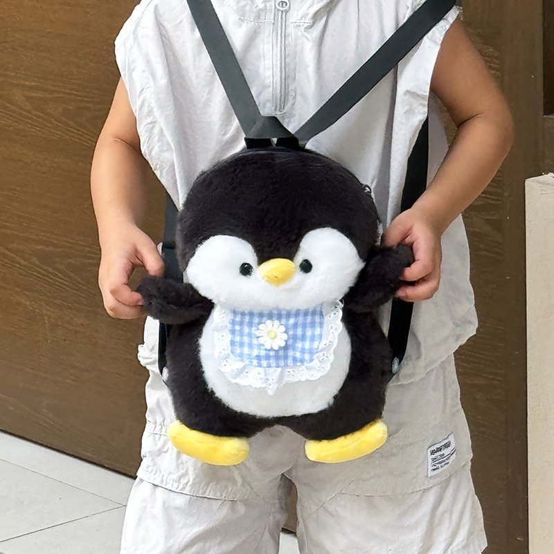 New cartoon apron, penguin backpack, cute and girlish plush toy, penguin doll, coin purse wholesale details Picture