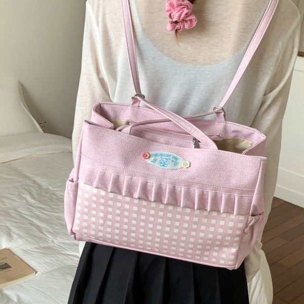Xiao Duoduo uses a large-capacity canvas bag for a single shoulder, a new stylish and eye-catching lace tote bag for a backpack Application Scenario
