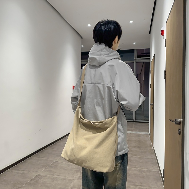 Japanese-style simple canvas bags for men and women, cool large-capacity hand-held shoulder bags, casual student class Korean-style crossbody bags details Picture