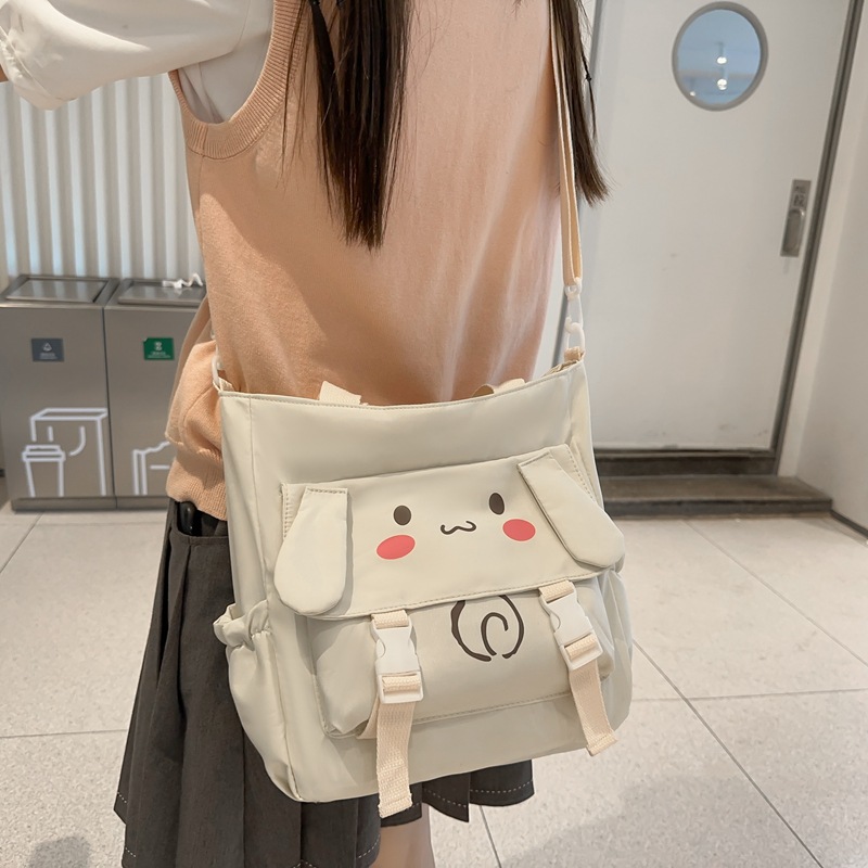 Cute ins student crossbody bag, soft girl's new class single-shoulder bag, retro school style postman's hand-held canvas bag Application Scenario