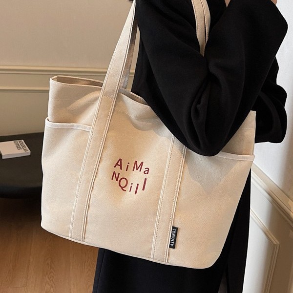 The casual canvas tote bag is a versatile women's bag for autumn and winter 2024. It is a simple, large-capacity, lightweight single-shoulder bag for going out Specification drawing