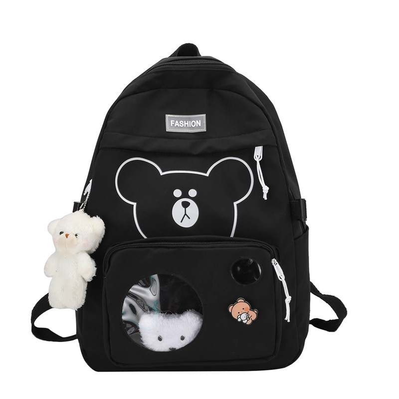 New candy-colored schoolbag for primary school students, cute cartoon bear, school-style backpack, and women's casual backpack Item Picture