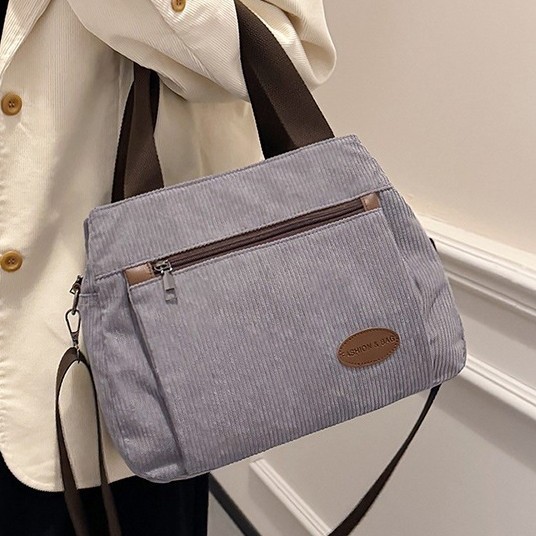 Large-capacity canvas bag for women, 2024 new crossbody bag, fashionable and versatile commuting tote bag, after-school single-shoulder tote bag details Picture