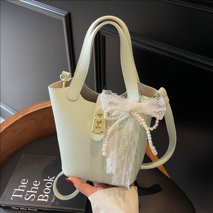 Cross-border lychee pattern fashionable and high-end hand-held bucket bag 2025 new style stylish, simple and versatile single-shoulder crossbody bag full figure