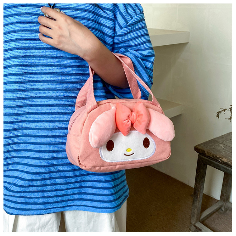 Melody KT Cat hand-held canvas large-capacity work handbag, cartoon cloth bag, fashionable embroidered handbag details Picture
