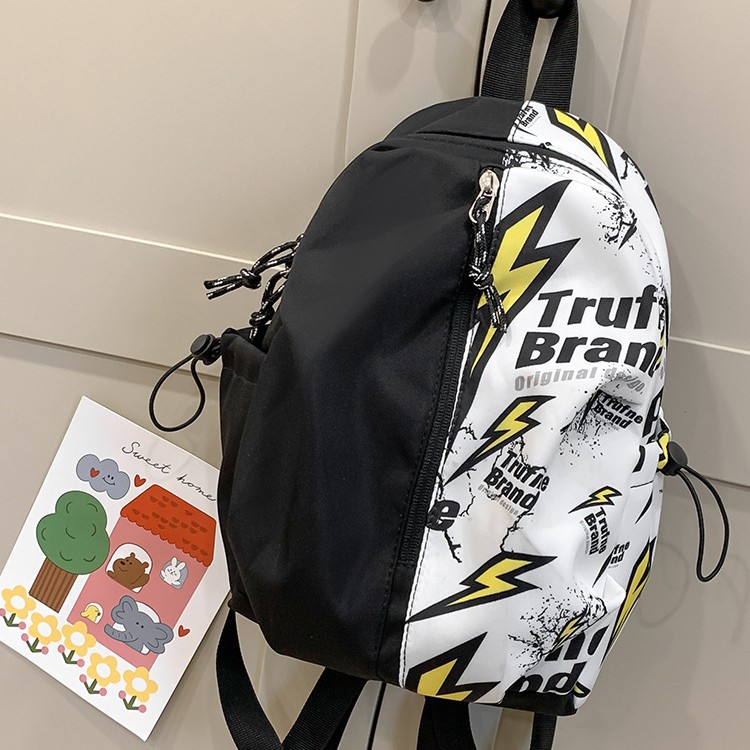 Graffiti comic fashion schoolbags for both boys and girls, backpacks for junior high school and college students, and men's and women's same style backpacks for leisure travel Application Scenario