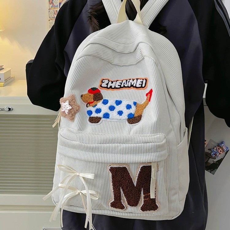 New autumn and winter 2024 Cute cartoon dog student backpack with large capacity and sweet bow for girls Application Scenario