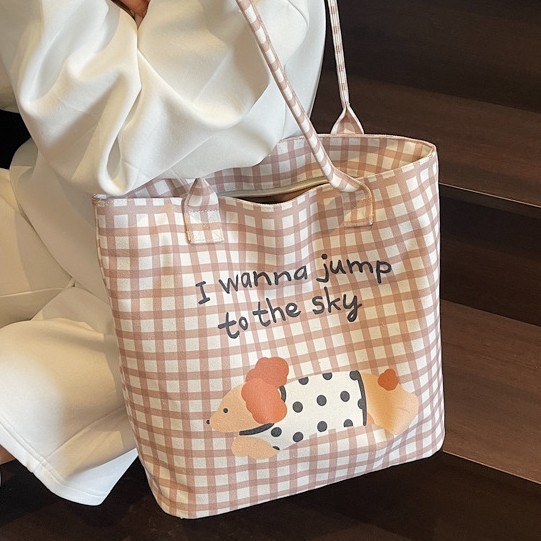 A new Japanese-style cartoon canvas bag, a student hand-held cartoon dog tote bag, and a portable handbag with a check pattern for girls Application Scenario