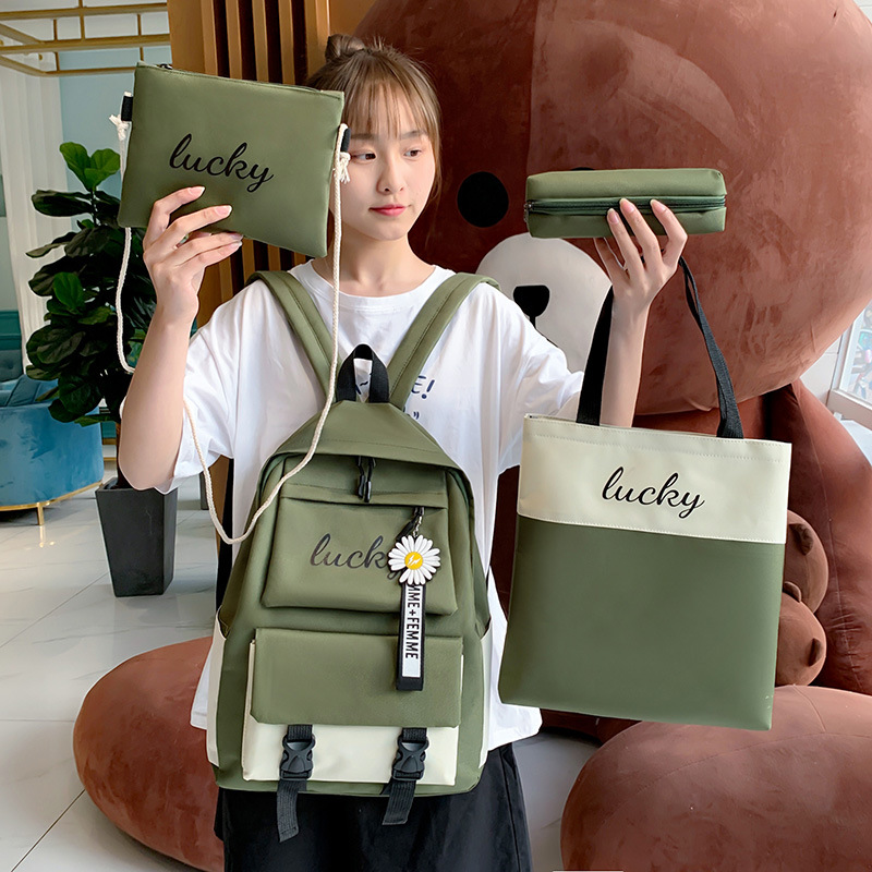 Wholesale of four-piece sets for junior and senior high school students, including new Korean version backpacks for girls with contrasting letters and colors Application Scenario