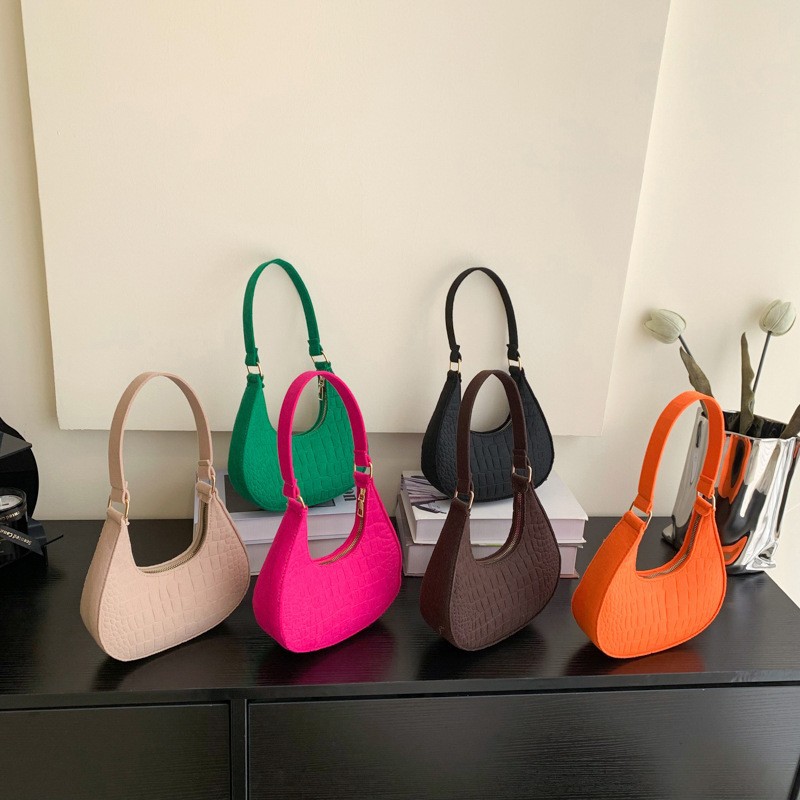 Solid color elegant ladies' bag 2023 Trendy Korean summer new stone pattern underarm bag casual single-shoulder handbag full figure