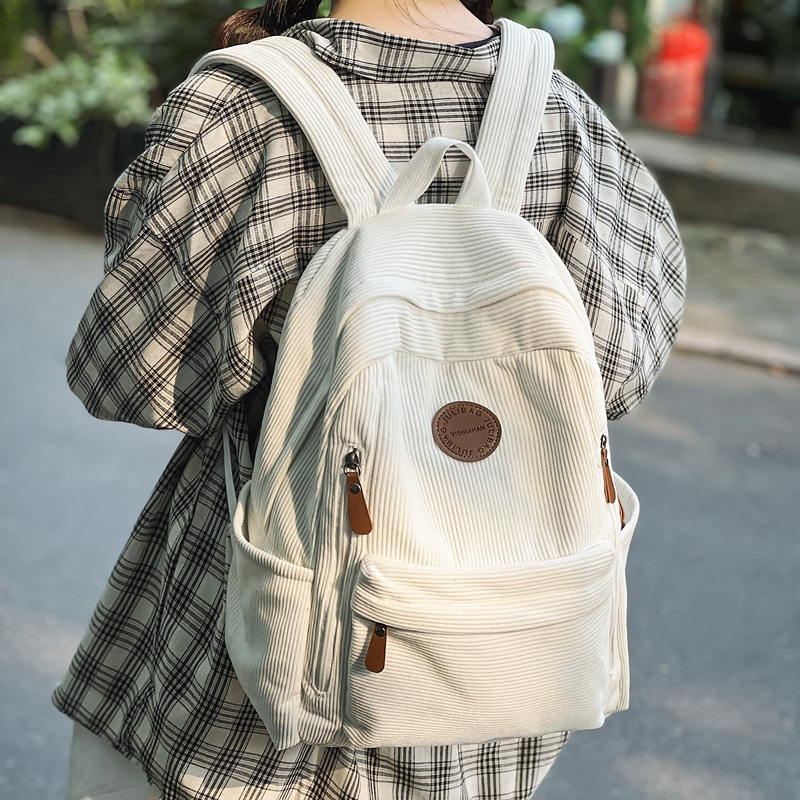 The new corduroy backpack for autumn and winter 2024 is a solid color versatile large-capacity backpack suitable for both men and women details Picture