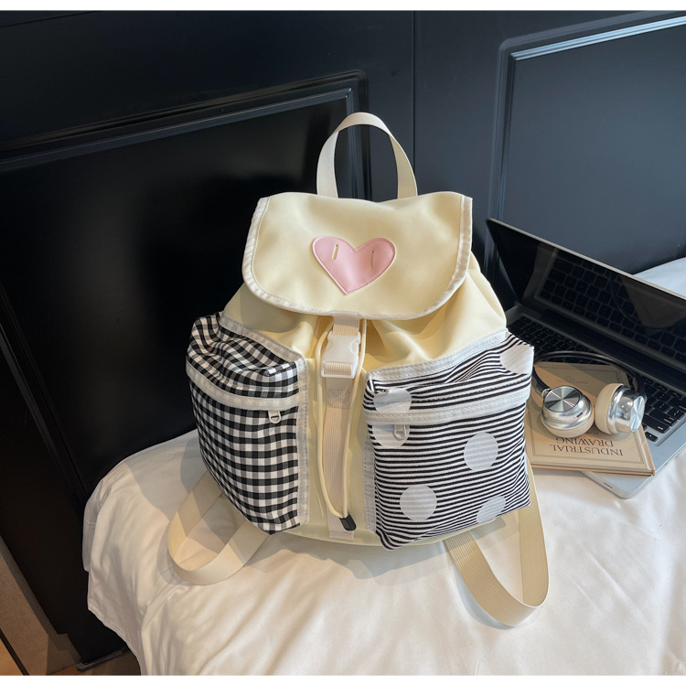 Korean style backpack, fashionable and versatile, high appearance level, cute summer backpack for female college students, new schoolbag color block 2025 Application Scenario