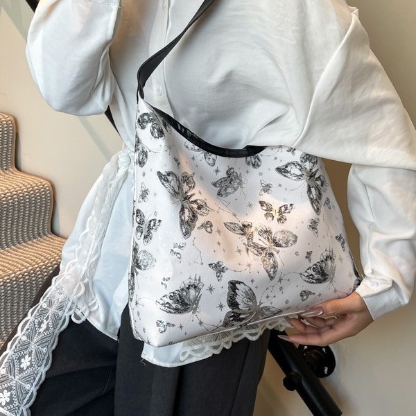 The 2025 new style of stylish and elegant design, single-shoulder crossbody, stylish butterfly, retro and fresh, underarm texture handbag Application Scenario