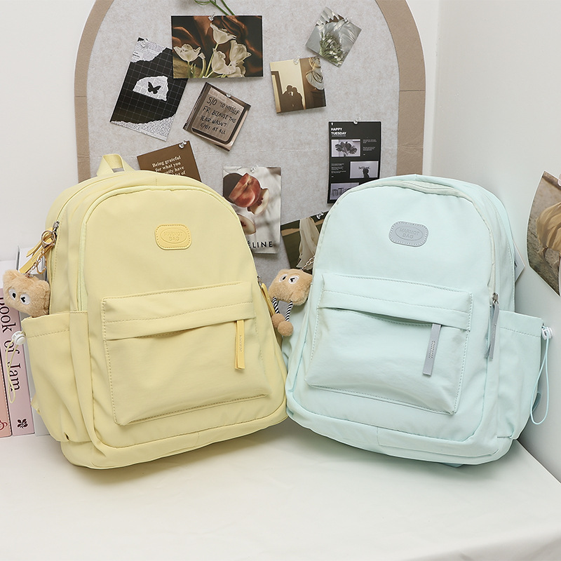 Simple and versatile schoolbag for junior high school girls 2025, fashionable backpack for niche high school and primary school students, travel backpack trend full figure