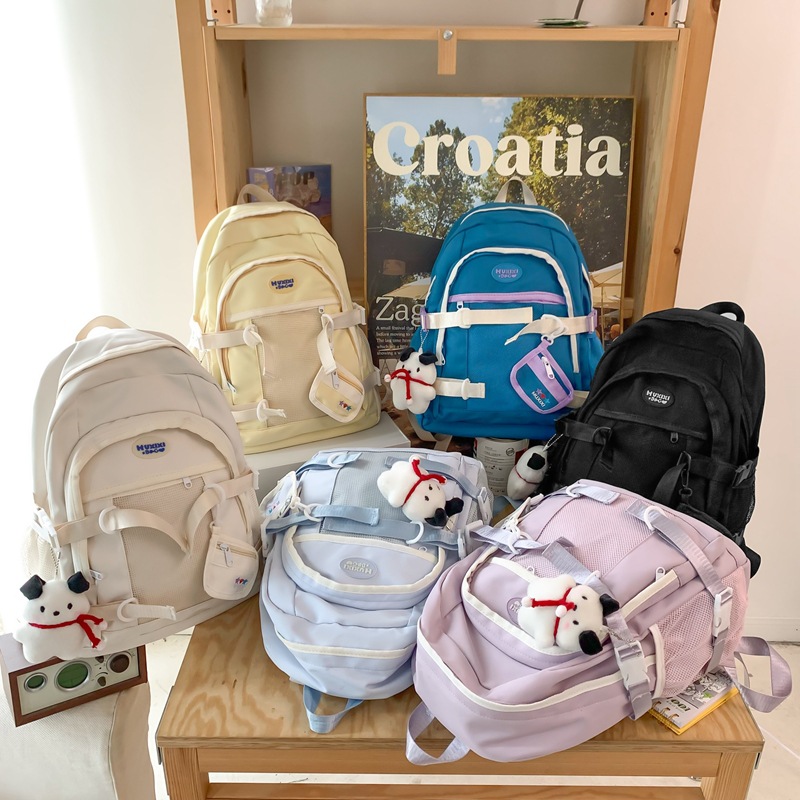 A fresh and trendy backpack for girls, a simple and solid-colored large-capacity outdoor casual backpack for junior and senior high school students Specification drawing