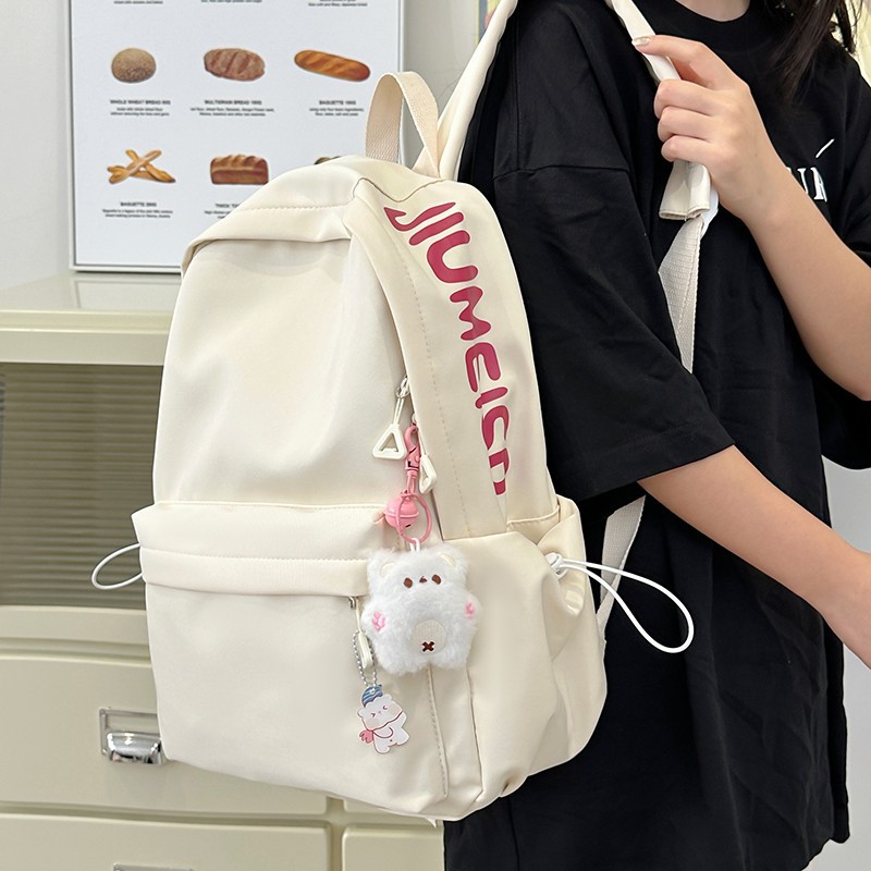 Simple foresty-style backpack with lettered schoolbag, new model for campus 2025, versatile for commuting, large capacity, solid color for going out Application Scenario