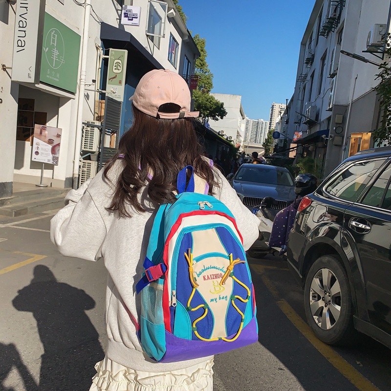 Cross-border niche color-blocking backpack, large-capacity schoolbag for female college students, junior and senior high school students, cute travel backpack full figure