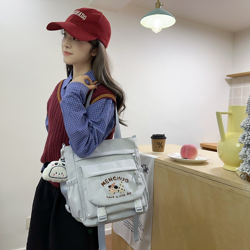 Japanese-style ins Academy style tote bag for junior high school students' classes, cute cartoon embroidered dog, large-capacity single-shoulder bag details Picture