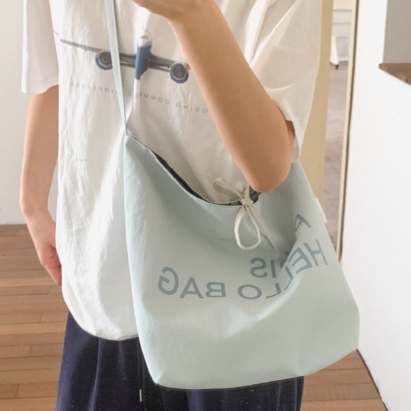 The Korean version of the ins large bag women's 2025 new style canvas tote bag, artistic and retro, large capacity single-shoulder crossbody handbag details Picture