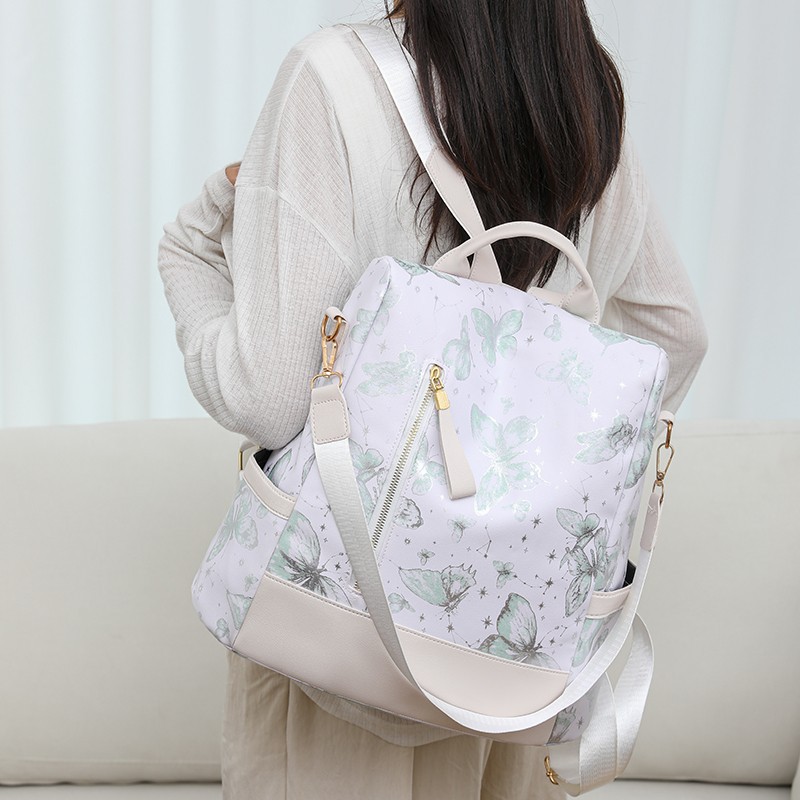 The new printed backpack is a fashionable large-capacity hand-held shoulder bag for women. It is a casual travel backpack and very cute Specification drawing