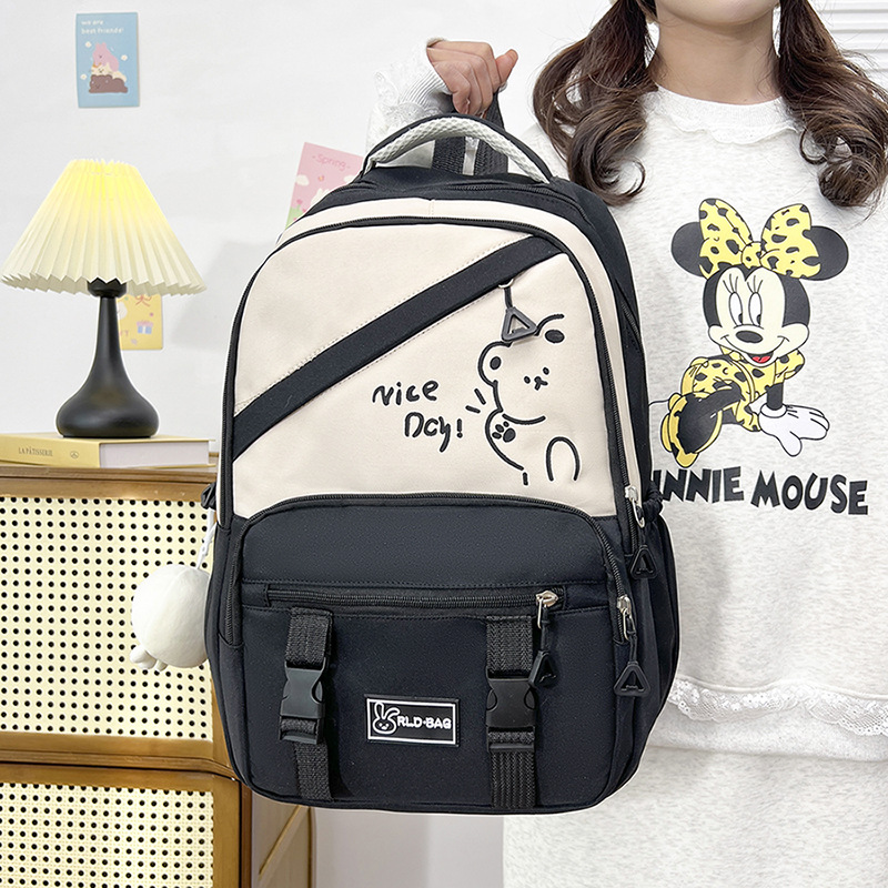 Simple and niche design backpack, cartoon graffiti schoolbag, girls' junior high school and senior high school students' casual backpack, girls' college students full figure
