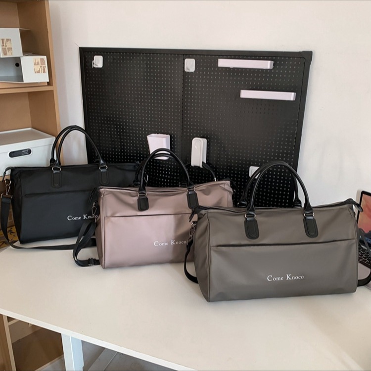 Wholesale of new spring fashionable travel bags, large-capacity trendy Korean-style fitness bags for men and women, and fashionable luggage handbags full figure