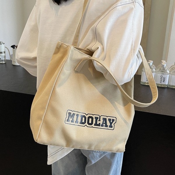Canvas bag, college student handbag, versatile, large capacity, casual and simple, single-shoulder crossbody bag, commuting bag Item Picture