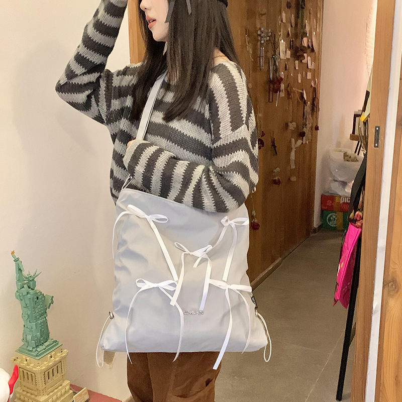 Bow sweet and niche single-shoulder bag, Korean-style ins checkered large-capacity canvas bag, artistic girl tote bag details Picture