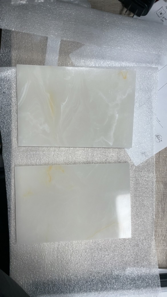 Shanghai translucent stone, acrylic marble plate, jade-like luminous board, background board sample, villa bar details Picture