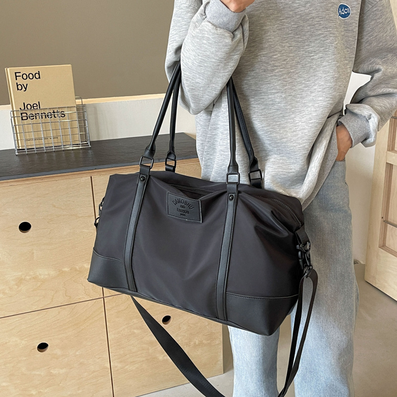2025 New Korean version short travel bag, large-capacity sports and fitness bag, business trip case, trolley case, hand-held storage bag details Picture