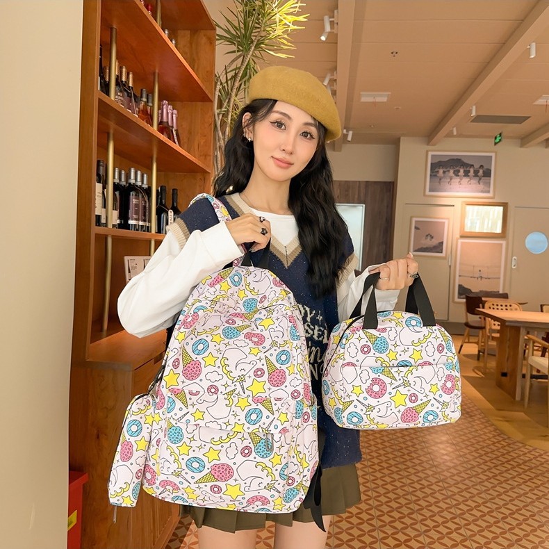 Wholesale of 2025 new backpack printed graffiti multi-piece set, lightweight and large-capacity backpack for middle school students details Picture
