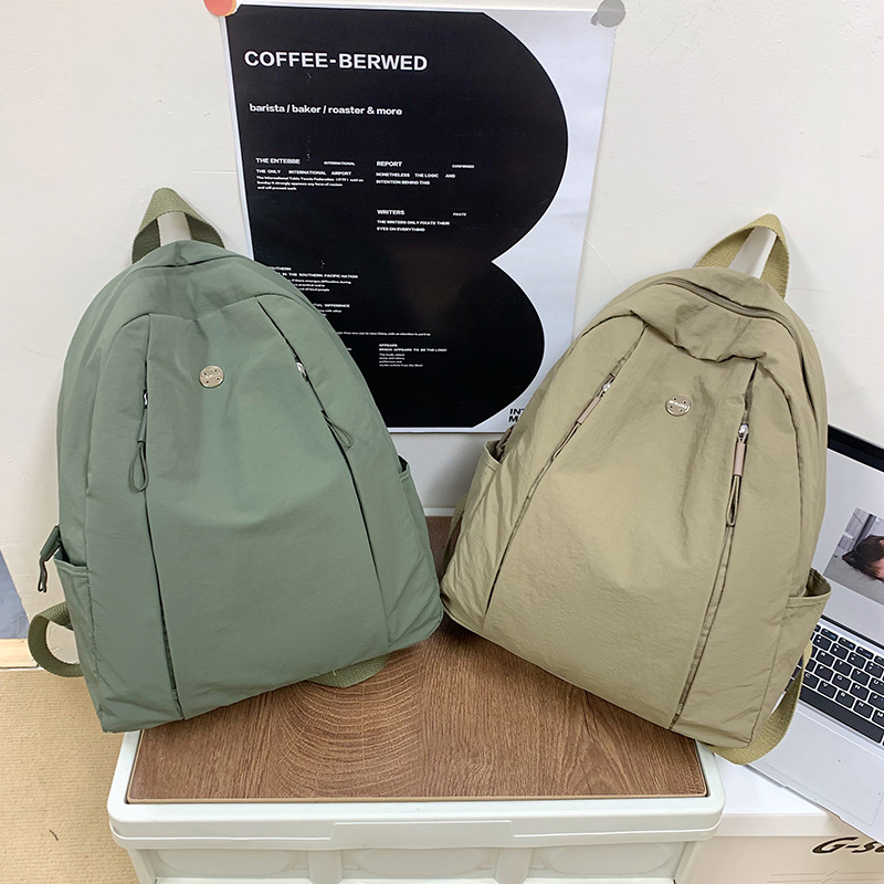 New casual school travel backpack, lightweight and large-capacity nylon fabric study bag, waterproof backpacks for both boys and girls full figure