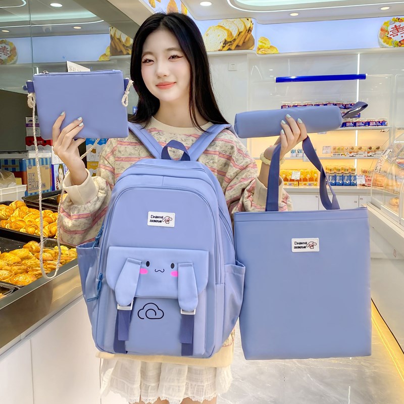 Casual, lightweight, versatile and cute girls' backpacks are selling well across borders. They are large-capacity four-piece schoolbags for girls details Picture