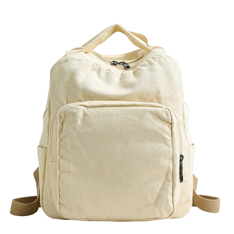 A simple solid-color backpack for Japanese high school and college students, a washable and aged canvas bag, and a retro travel backpack Item Picture