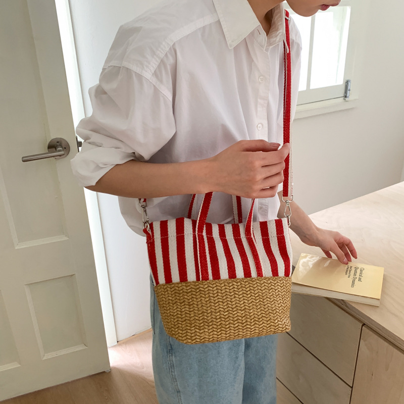 Korean-style casual and artistic large-capacity hand-held tote bag for women, fashionable striped canvas color-blocking versatile single-shoulder crossbody bag Application Scenario