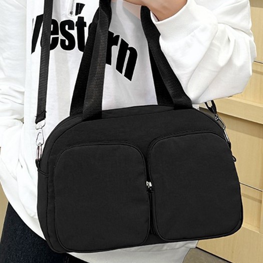 Korean version large-capacity hand-held versatile women's bag, travel bag, short-distance solid-color fashionable casual light shoulder bag, crossbody bag details Picture